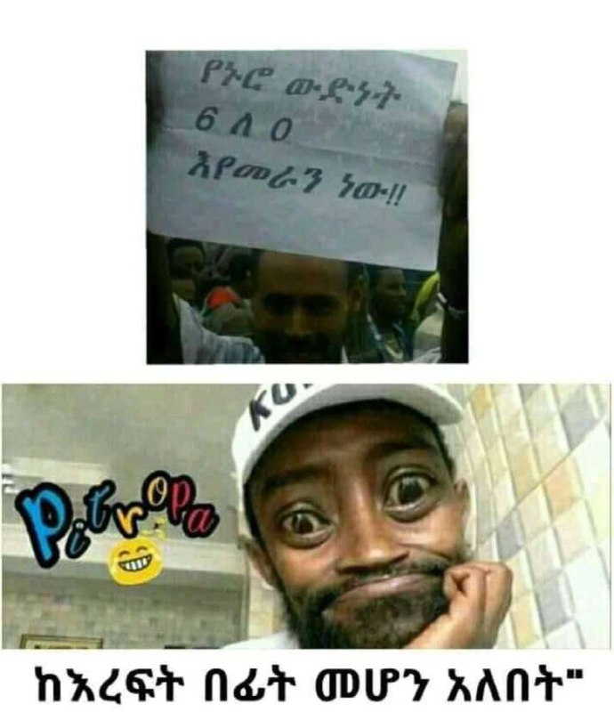 a man holding a sign that says, i m 